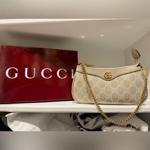 Gucci Beige Canvas Clutch with Gold Chain